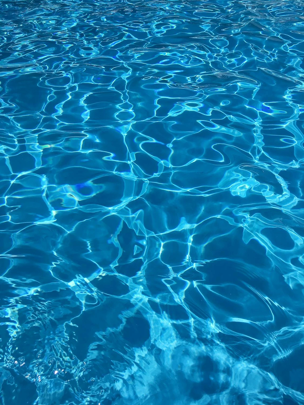 Blue pool water up close